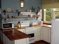 Kenya Cottage - Redcliffe Tourism 4