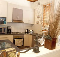 Anderl's Beach Cottage - Redcliffe Tourism