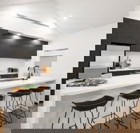 Abode Accommodations - Redcliffe Tourism