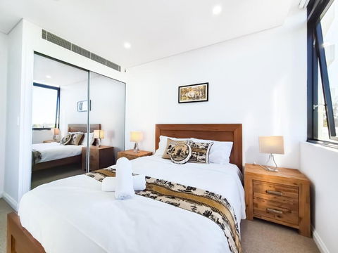 Relaxing 1BR W Pools & SPA, Gym In Olympic Park - Redcliffe Tourism 0